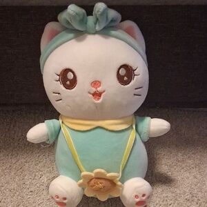 White and Green Stuffed Cat Toy